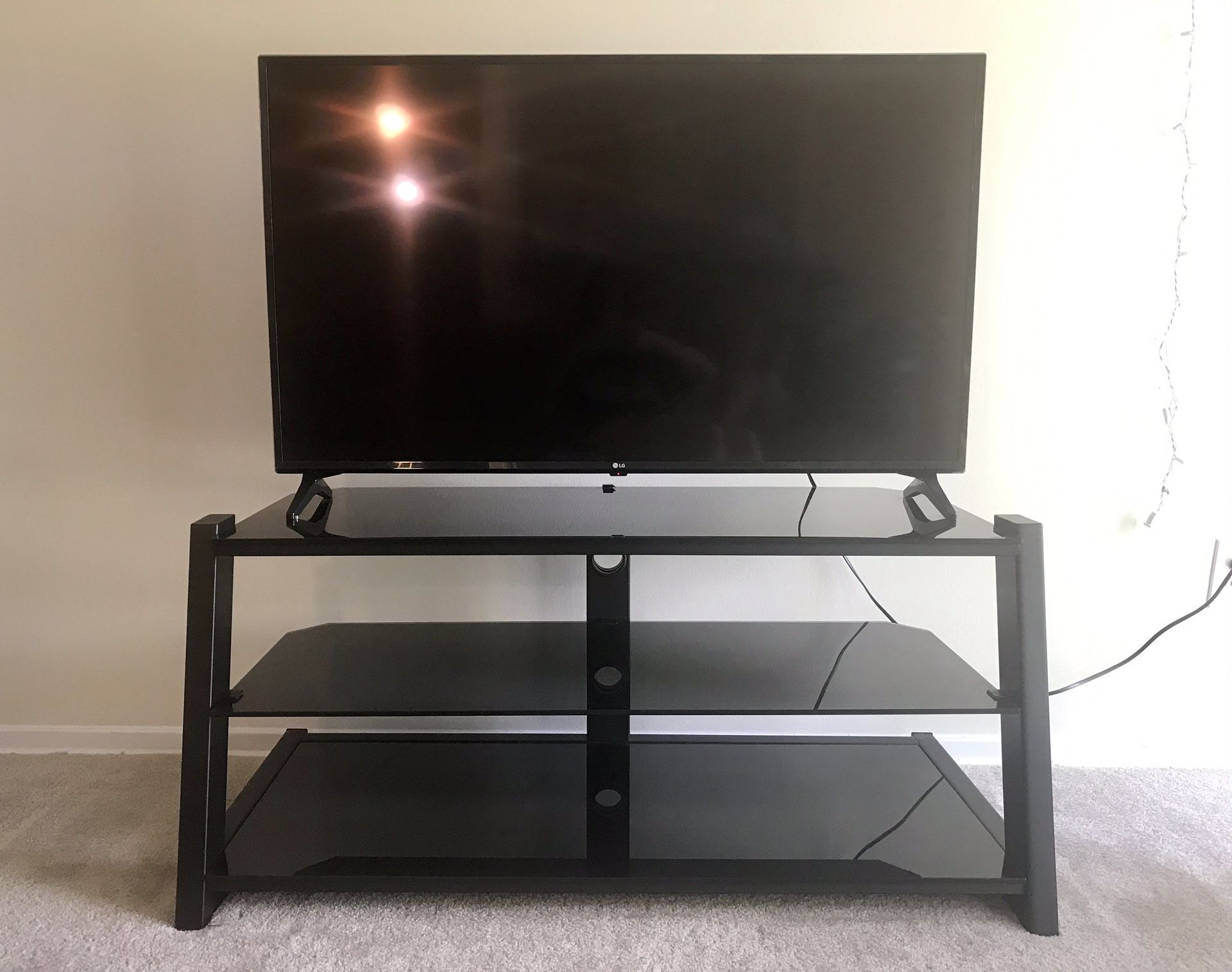 Black glass/metal TV stand (50 inches)