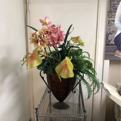 Artificial flowers In Tin Urn