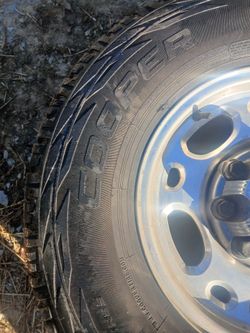 90% new 265/75R/16 tires and rims
