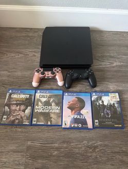 PS4 Slim Bundle with 2 Controllers and 4 Games