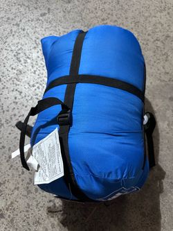 Blue Sleeping Bag Rolled with Straps