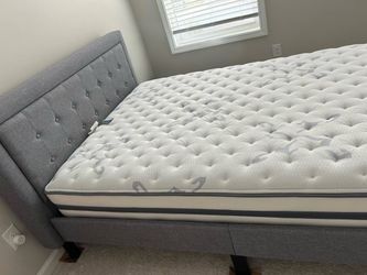 Full-size bed with mattress