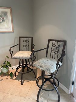 Swivel pair of island stools