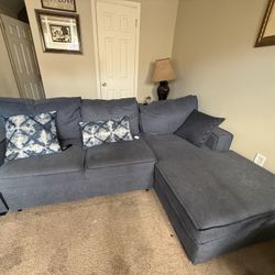 Gray Sectional couch with pull-out bed