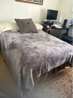 Queen bed with frame.
