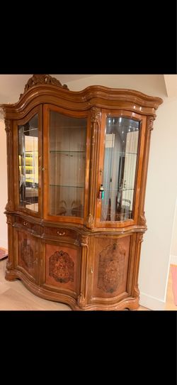 Regina walnut china cabinet
