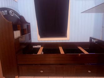 Full size bed with storage.