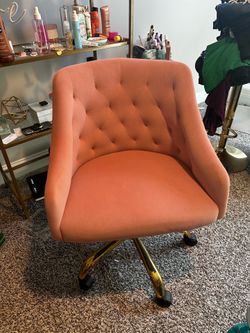Pink and gold office chair