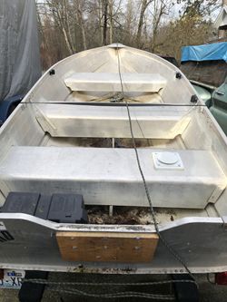 12 foot Aluminum boat with Caulkins trailer new bearings new tires. seats.  Electric motor rod holders Get ready fishing is right around the corner.  for Sale in Renton, WA - OfferUp