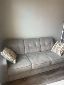 Brand new Sofa with cushions from roomstogo with receipt