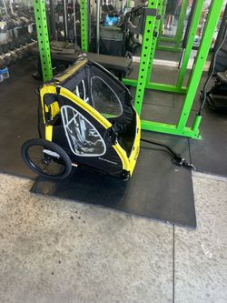 Kids bicycle attachment Schwinn kids cart  Like new Foldable  Easy to install wheels come off easy quick Release for easy transport  Cash only  Pick u