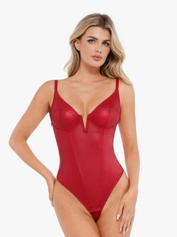Faux leather shaping bodysuit with a plunging V-neck and corset-style shaping.