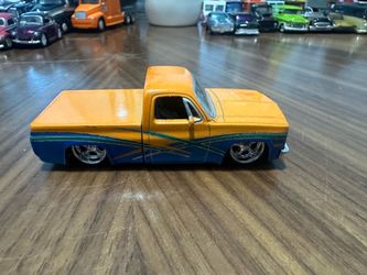 JADA DUB CITY KUSTOMS “85 C-10 1:64 SCALE