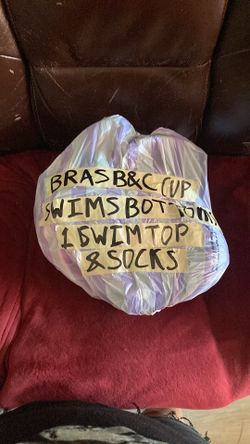 Bras, swim bottoms and one top plus socks and belt