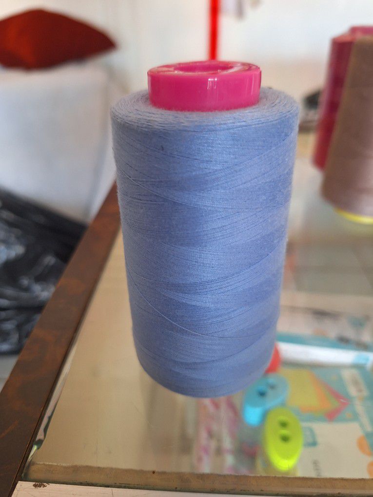 100% Silk Sewing Applique 50 weight Blue Thread 3,000 meters on a cone spool