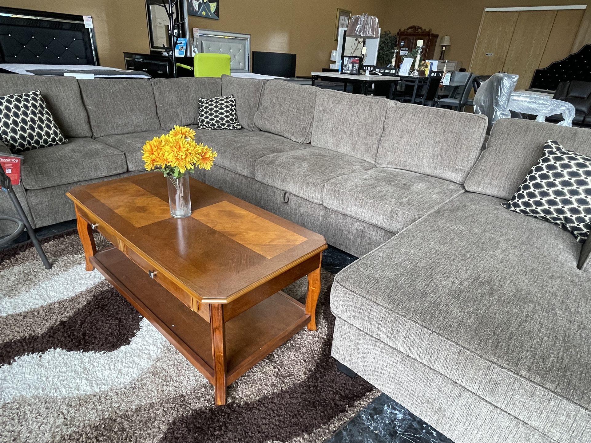 Large Brown Storage Sectional with Accent Pillows