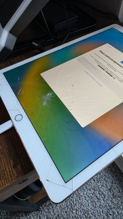 Apple iPad Pro 12.9" 1st Gen (Model A1652) – iCloud Locked / Cracked Glass – AS IS For Parts