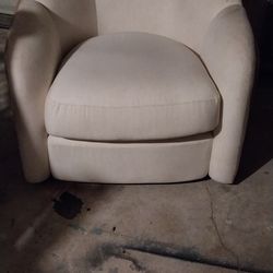 beige swivel chair