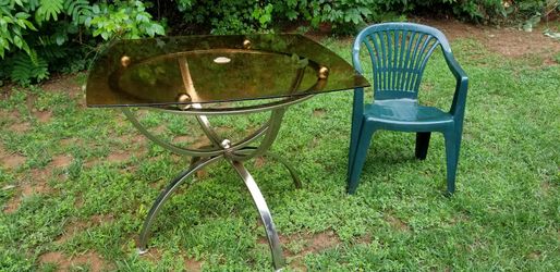Glass top table with four matching chairs excellent condition