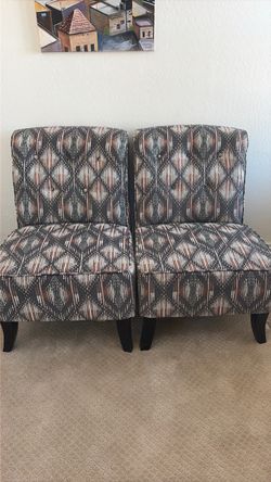 Two chairs colorful fabric like new