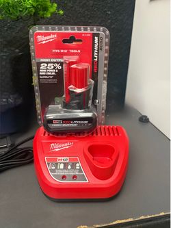 Milwaukee battery and charger new