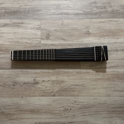 “Minicorda” Travel Guitar