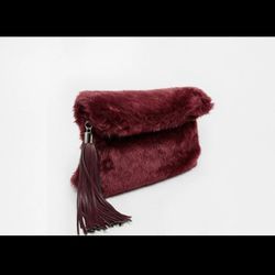 ASOS Burgundy Faux Fur Roll Top Clutch with Chunky Tassel