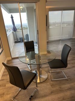 Scandinavian Designs Table and chairs