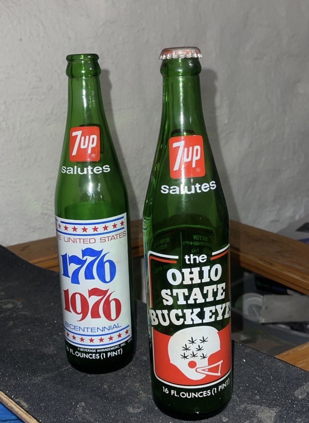  2 VINTAGE 7 UP Bottles 1973 Ohio State Buckeyes and 1976 Commemorating USA's Bicentennial 1(contact info removed)