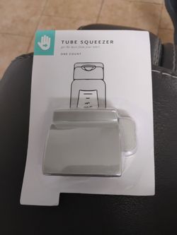 Toothpaste squeezer