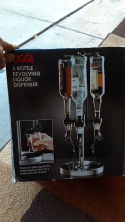 3 bottle liquor dispenser bran new ..