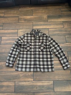 brown and black plaid button-up flannel shirt-jacket