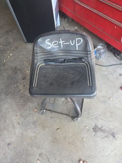 Mechanics chair with tool tray used but works