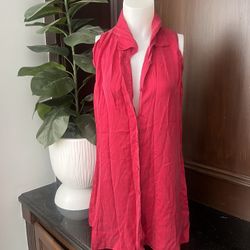Victoria’s Secret collared red, sleeveless button-down shirt, which is described as a Victoria's Secret silk collar dress or sleeveless night shirt  8