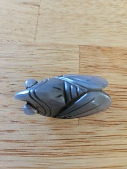 Hand-carved gray cicada pendant