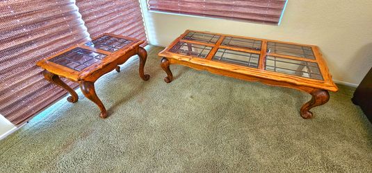 Beautiful wood/glass coffee table and end table.  Both $60