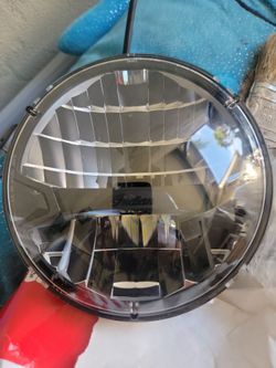 OEM LED headlight assembly, matching part number  used on Indian motorcycles such as the Challenger, Chieftain, Pursuit, and Roadmaster models.