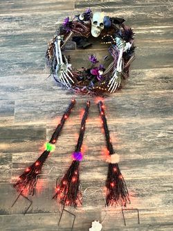 Halloween Skull Wreath and Light-Up Witch Broom Set