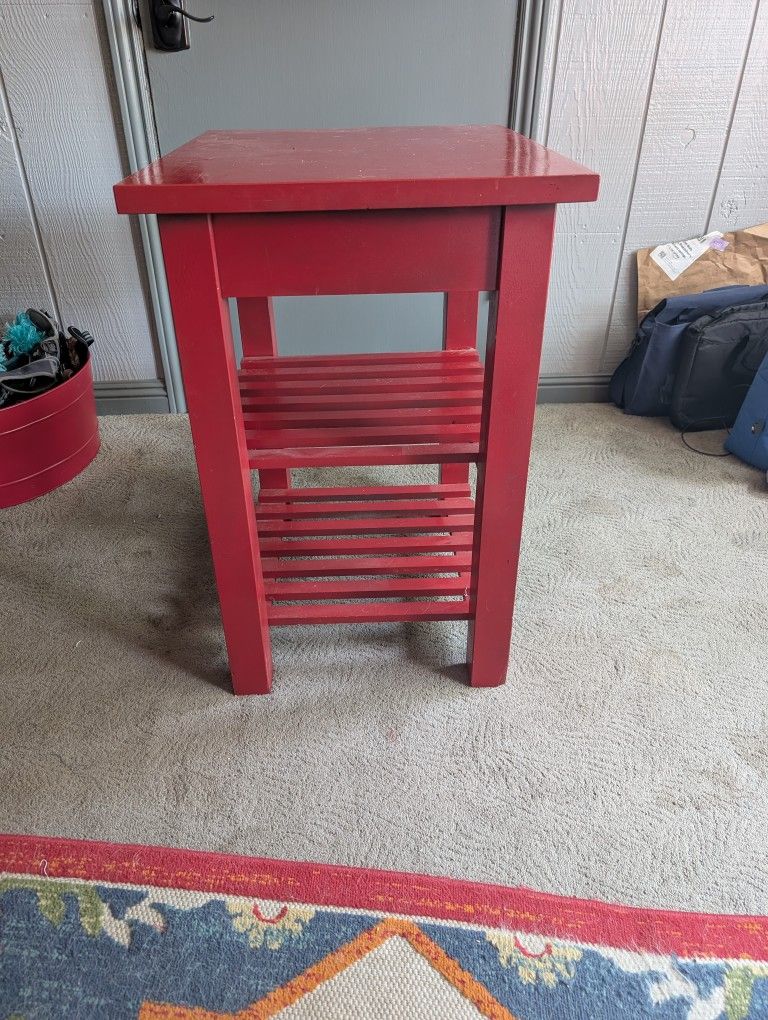 Red Table With Shelves