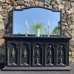 Buffet/TV Consol/dresser with mirror. Custom painted in black and sealed. Gold knobs solid wood