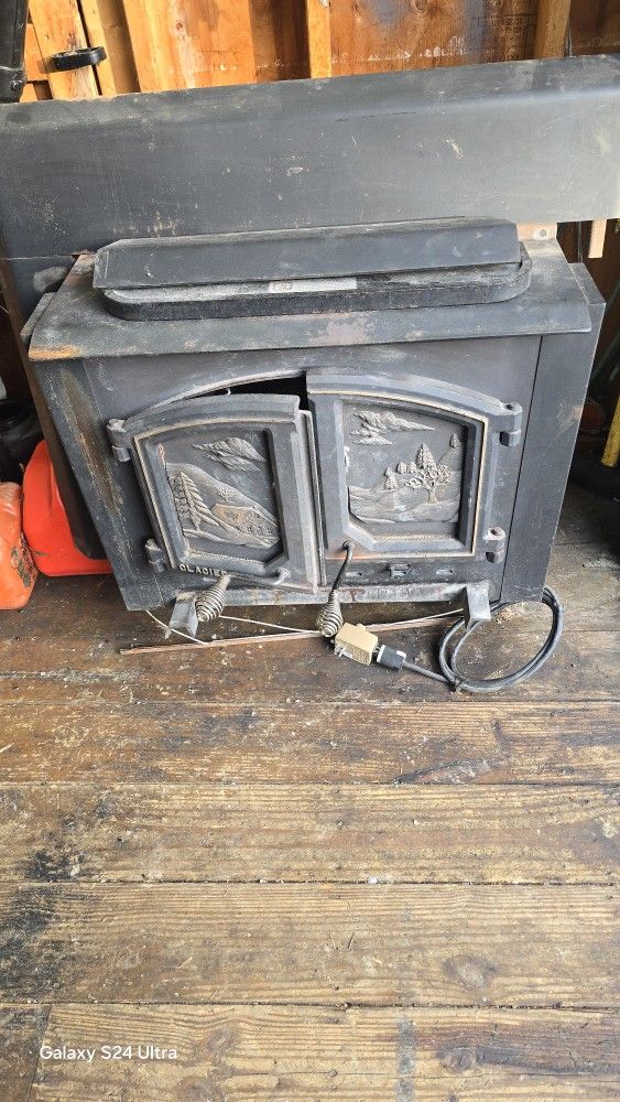 stove fits 36 inch fireplace opening with 2 fans