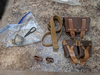 Vintage Soviet Union Mosin-Nagant stripper clip pouches, headspace gauge, sling, and oil bottle