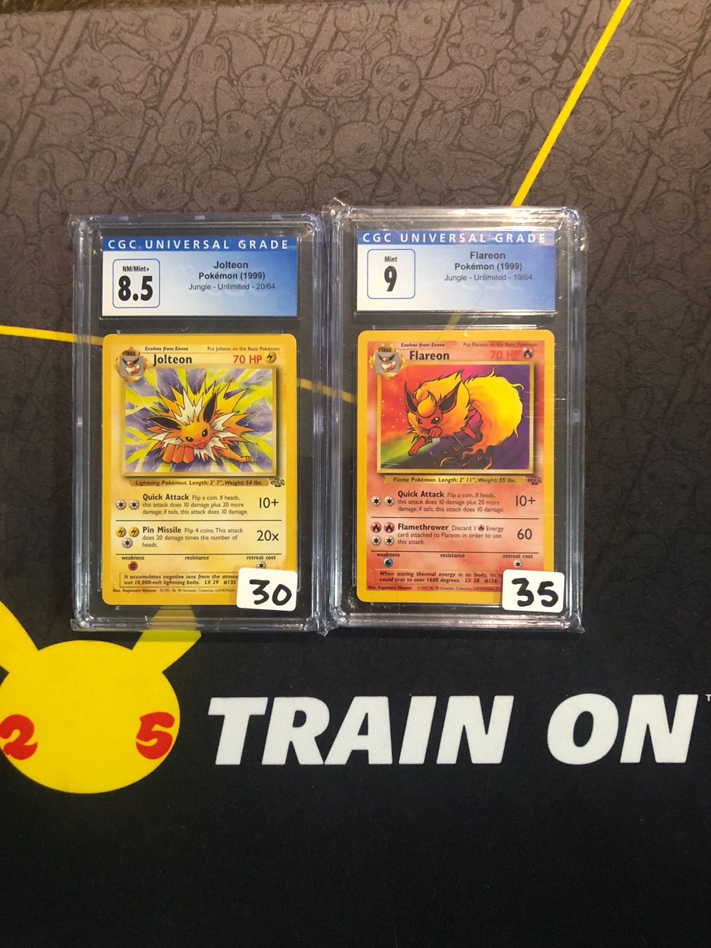 Pokémon Trading Cards Jolteon & Flareon From Jungle Set CGC Graded