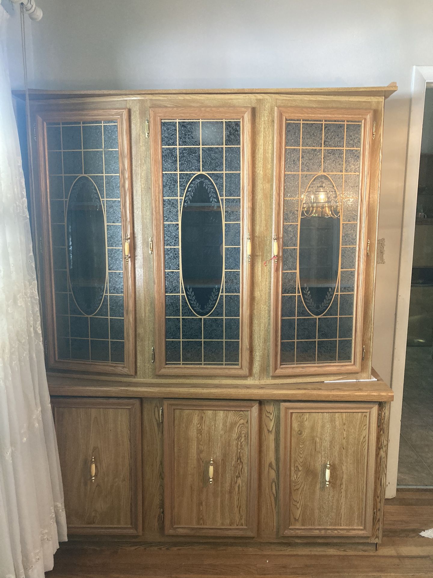 Two piece fancy glass cabinet