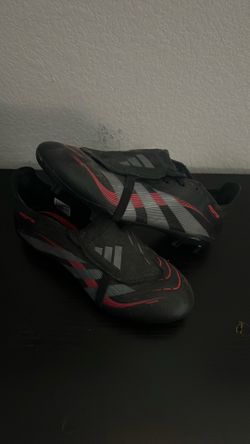 Size 8 black and red predator cleats