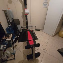 BowFlex with rowing machine and accessories