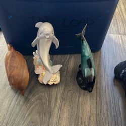 Three Dolphin Figurines