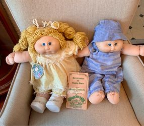 2 cabbage patch kids, one with tag and birth certificate. Both for $15