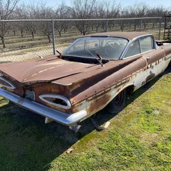 1959 Impala Two door on sheep Farm. 