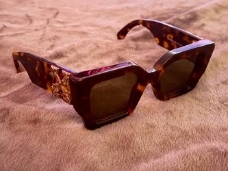 Off-White sunglasses CATALINA OERI003 6055 UNISEX in a tortoiseshell acetate frame with oversized square lenses and gold-tone logo hardware on the tem